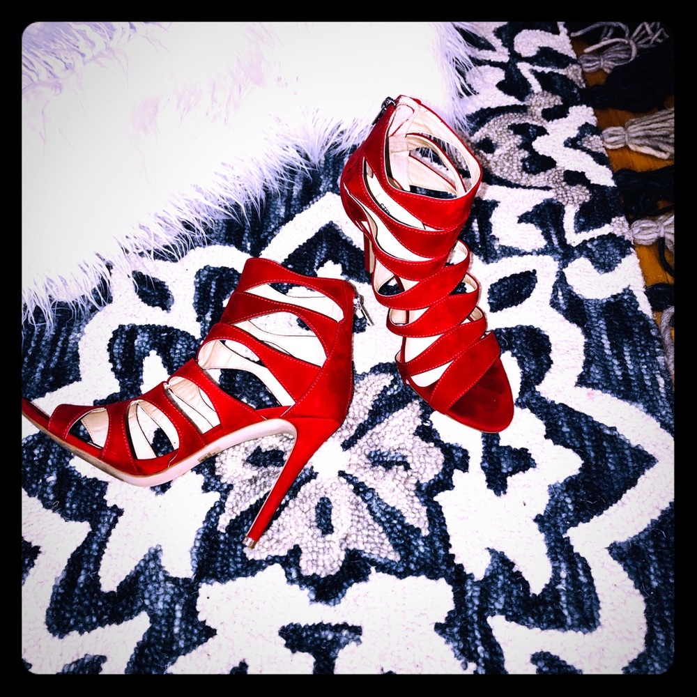 Red Stiletto, 4” heel with ankle strap, like new.